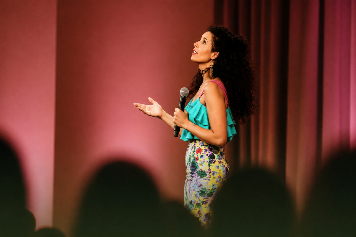 Ameera speaking on stage